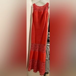 Beautiful, coral colored, lace formal dress.